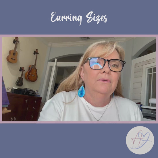 Load and play video in Gallery viewer, Peace Be With You Teardrop Earrings
